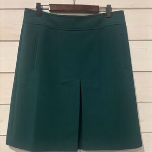 Loft Teal Midi Skirt in size 8. Pockets . Back slit . Great condition!